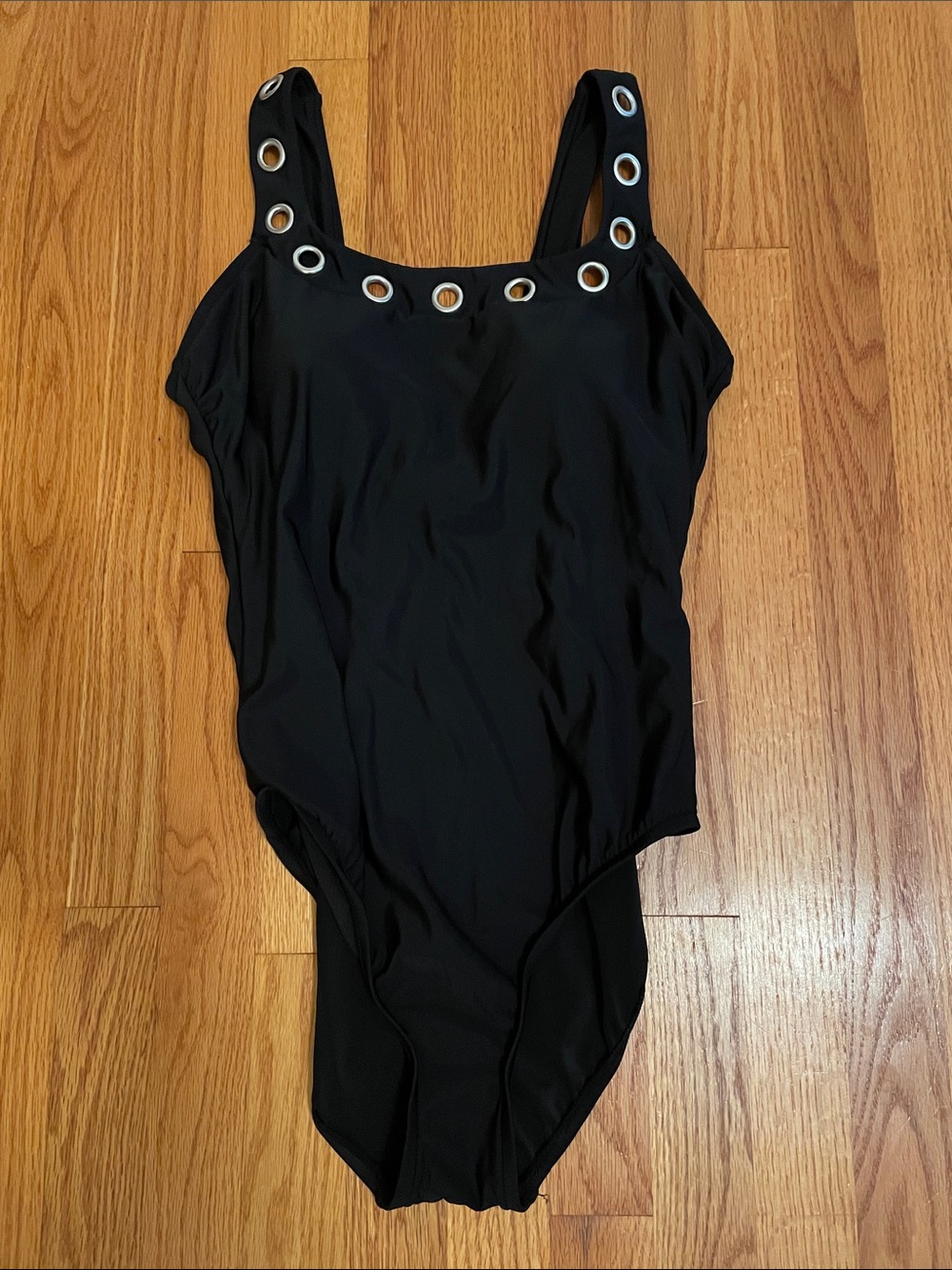 Black One-Piece Swimsuit with Silver Eyelet Trim
